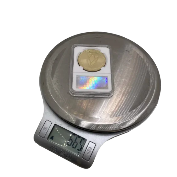 Monero (XMR) coin/medal in case