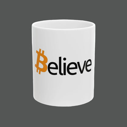 White mug with Bitcoin logo and 'Believe' text on a white background