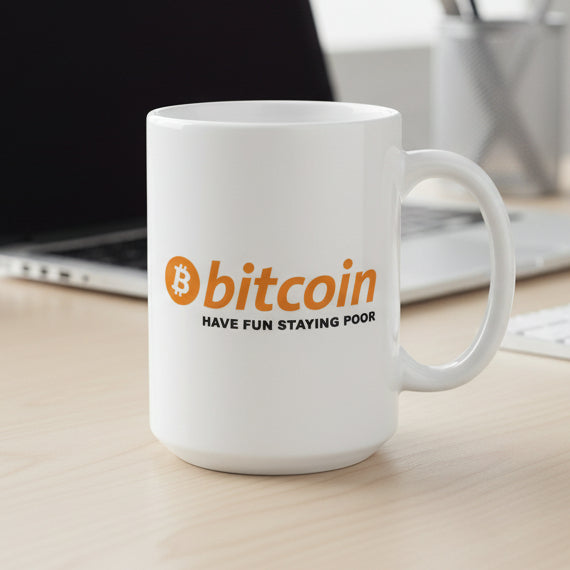 White mug with Bitcoin logo and text on a white background