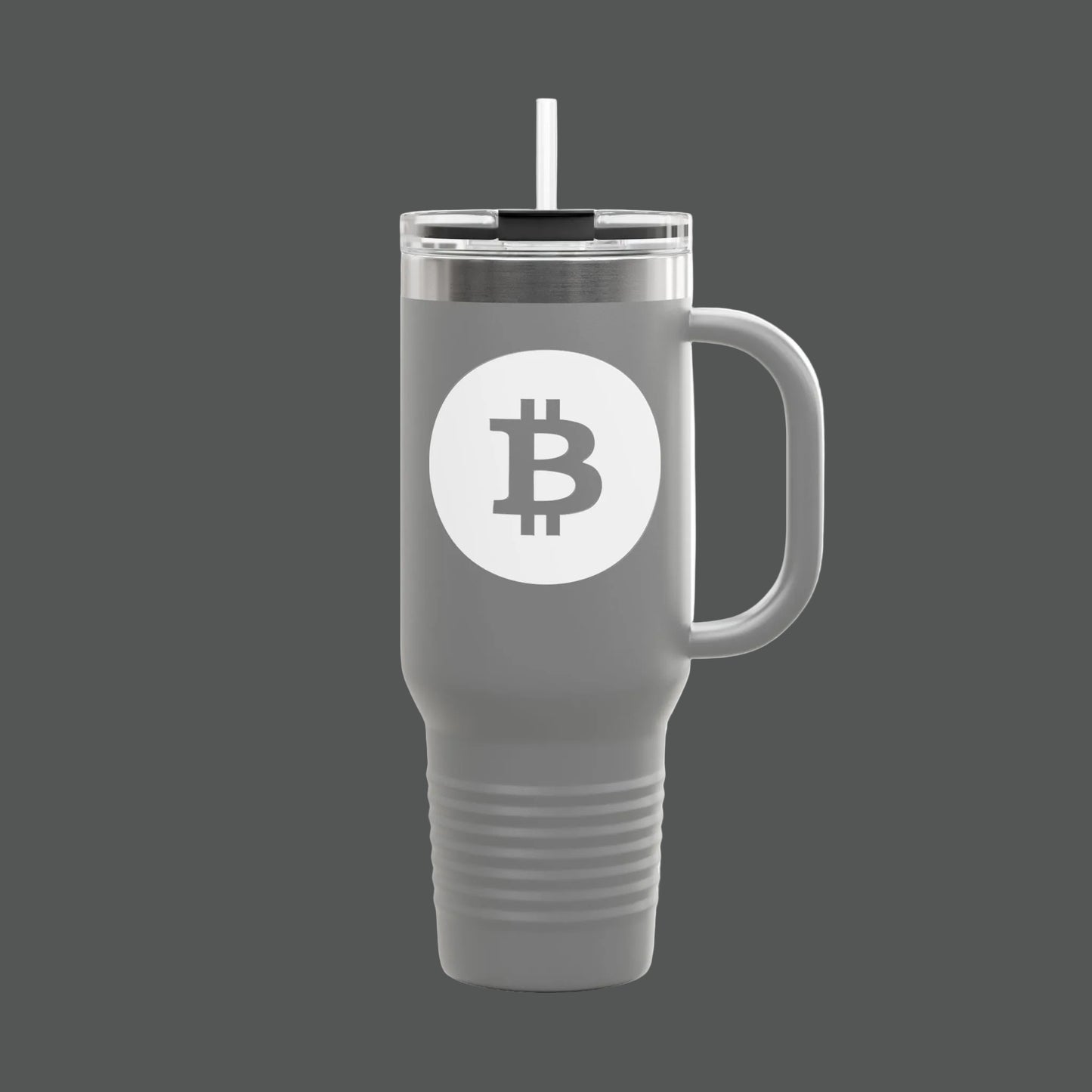Gray travel mug with a white label featuring a black logo on a white background