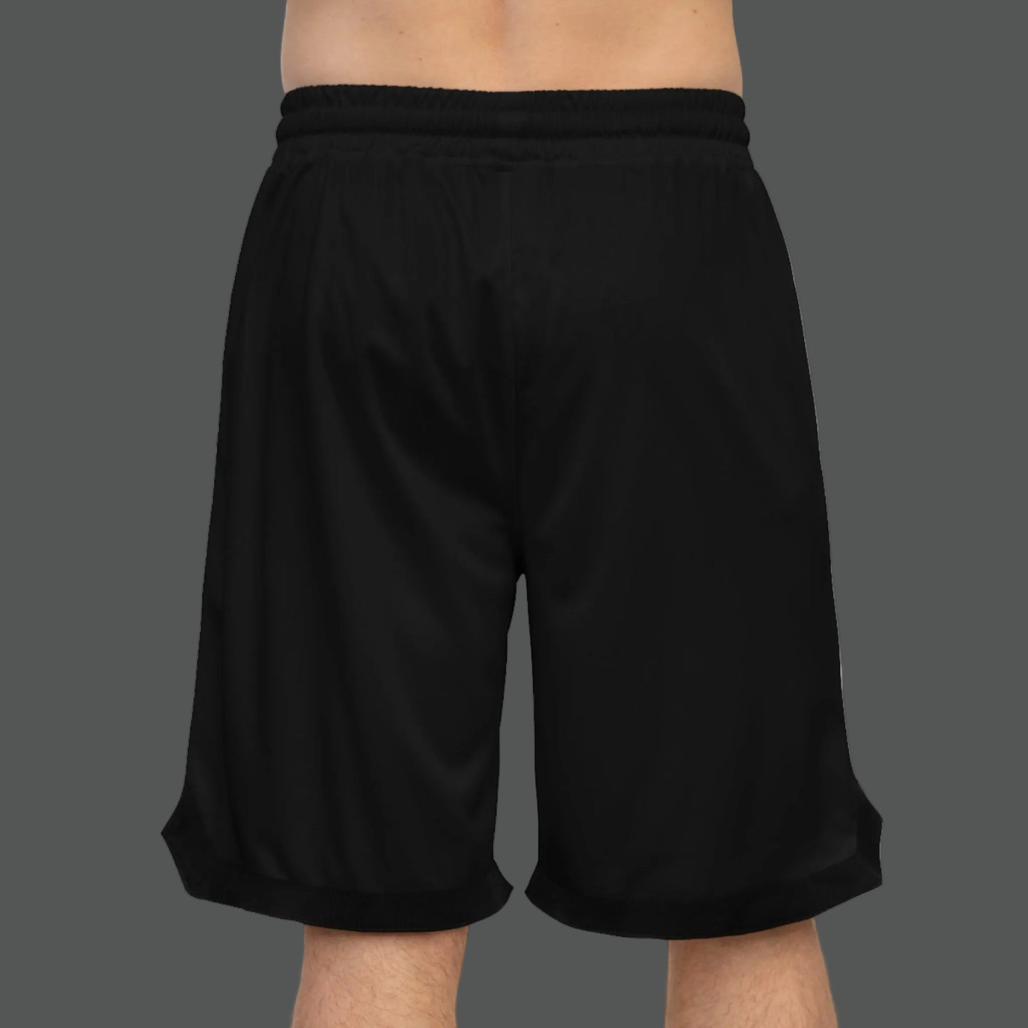 Black shorts with white speckle pattern worn by a person on a white background