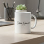 White mug with 'Satoshi Nakamoto EST. 2009' text on a white background