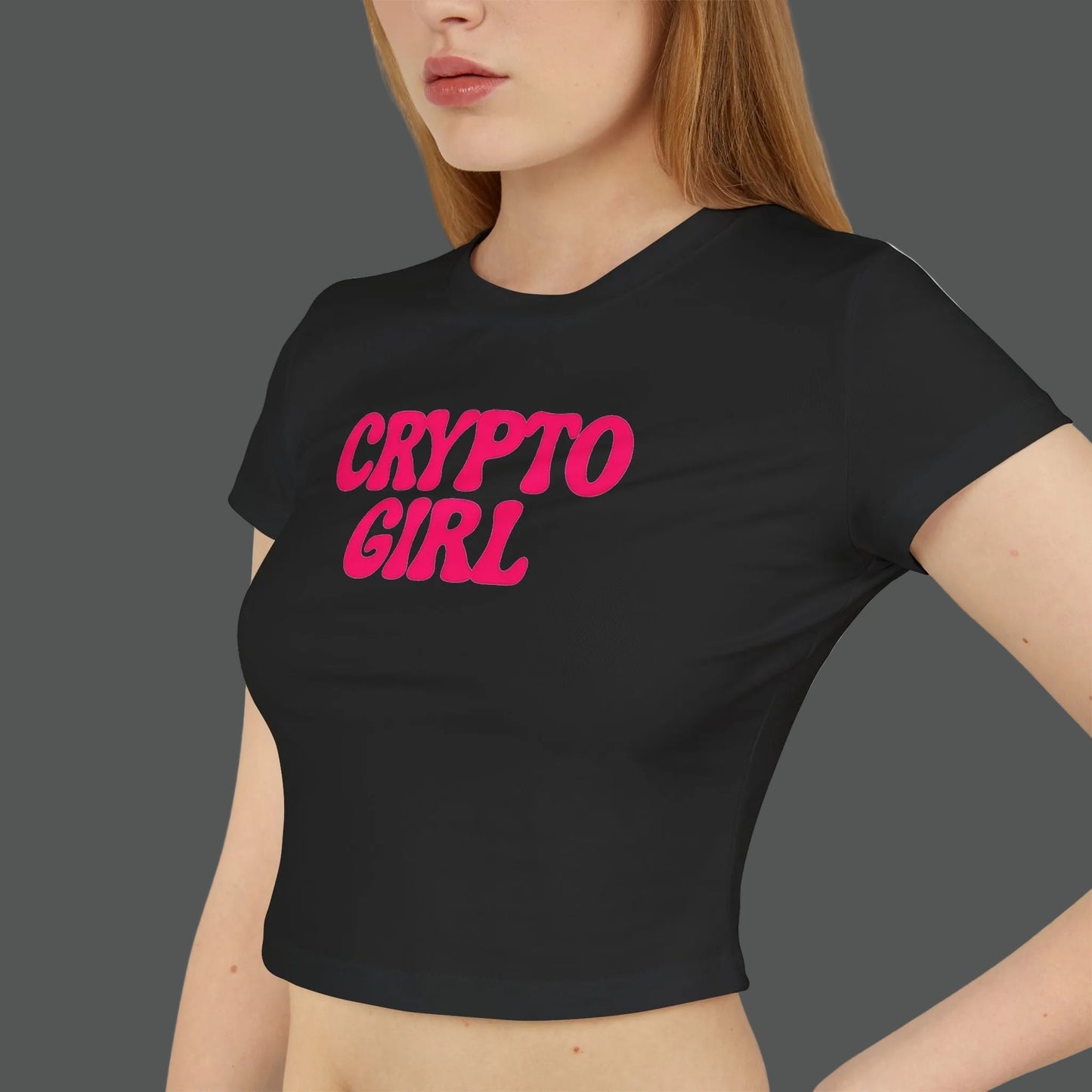 Black t-shirt with 'CRYPTO GIRL' in pink text worn by a person on a white background