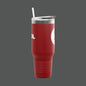 Red tumbler with a straw on a white background