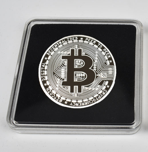 Bitcoin coin in a protective case on a white background