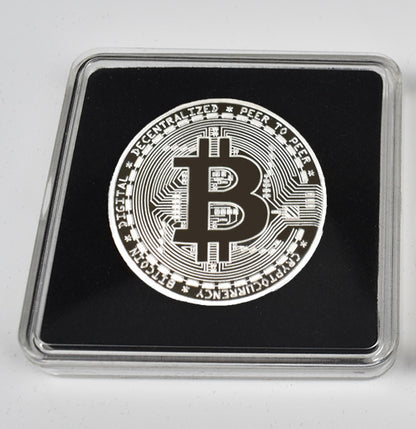 Bitcoin coin in a protective case on a white background
