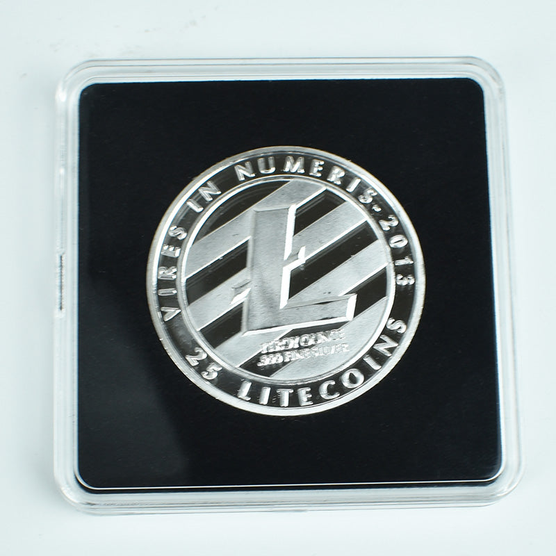 Silver litecoin coin in a clear case on a light gray background
