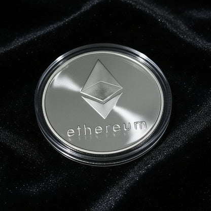 Silver Ethereum coin on a black background