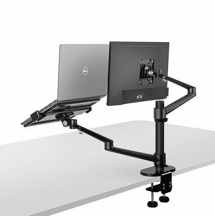 Black adjustable desk mount with laptop and monitor on a white background