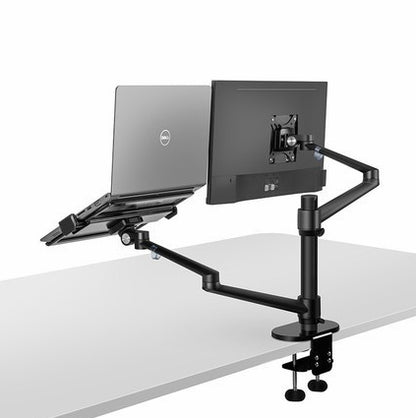 Black adjustable desk mount with laptop and monitor on a white background