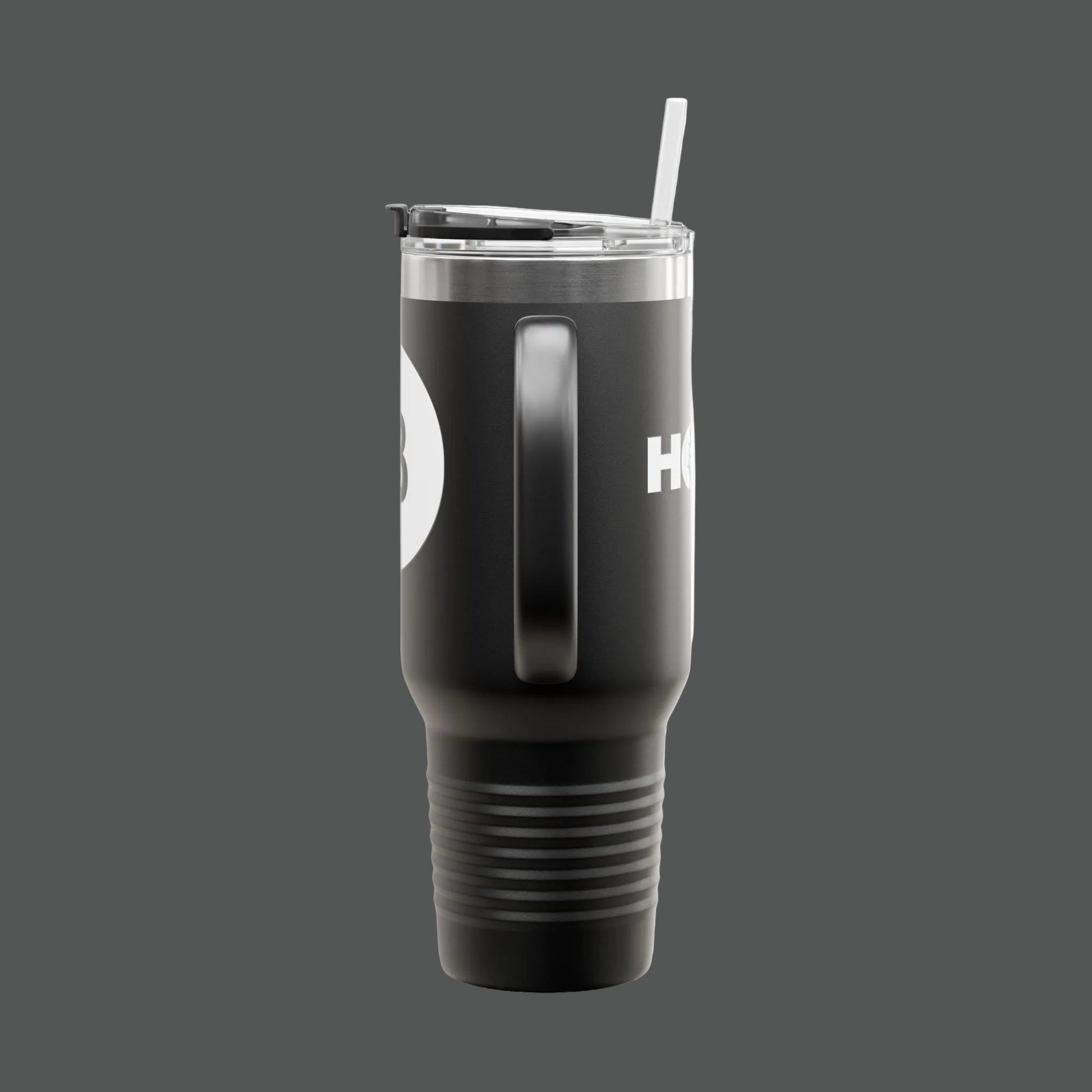 Black tumbler with a straw on a white background