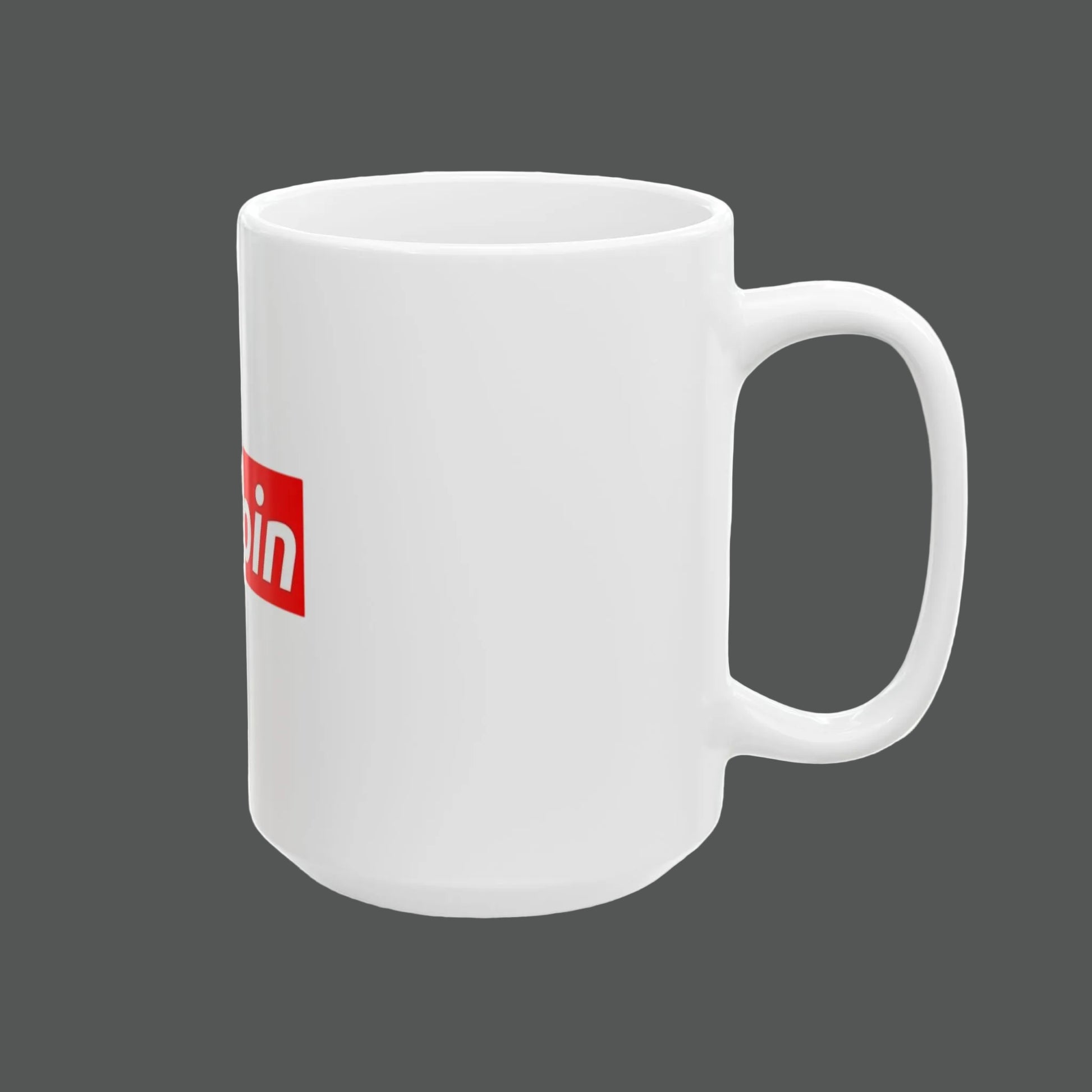 White mug with a red logo on a white background