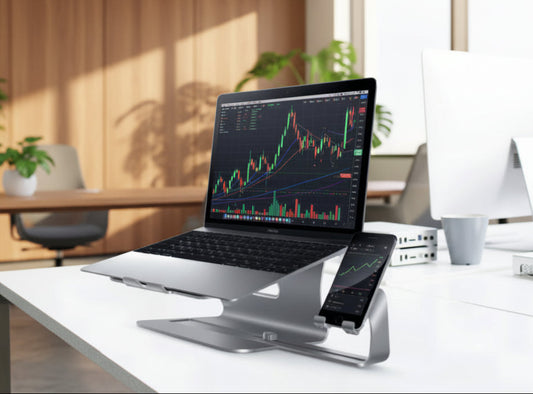 Laptop on a stand with a blurred office background