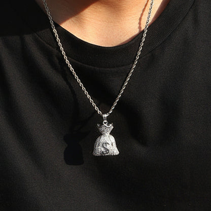 Person wearing a black t-shirt with 'ICE OUTBOX' logo and a silver necklace.