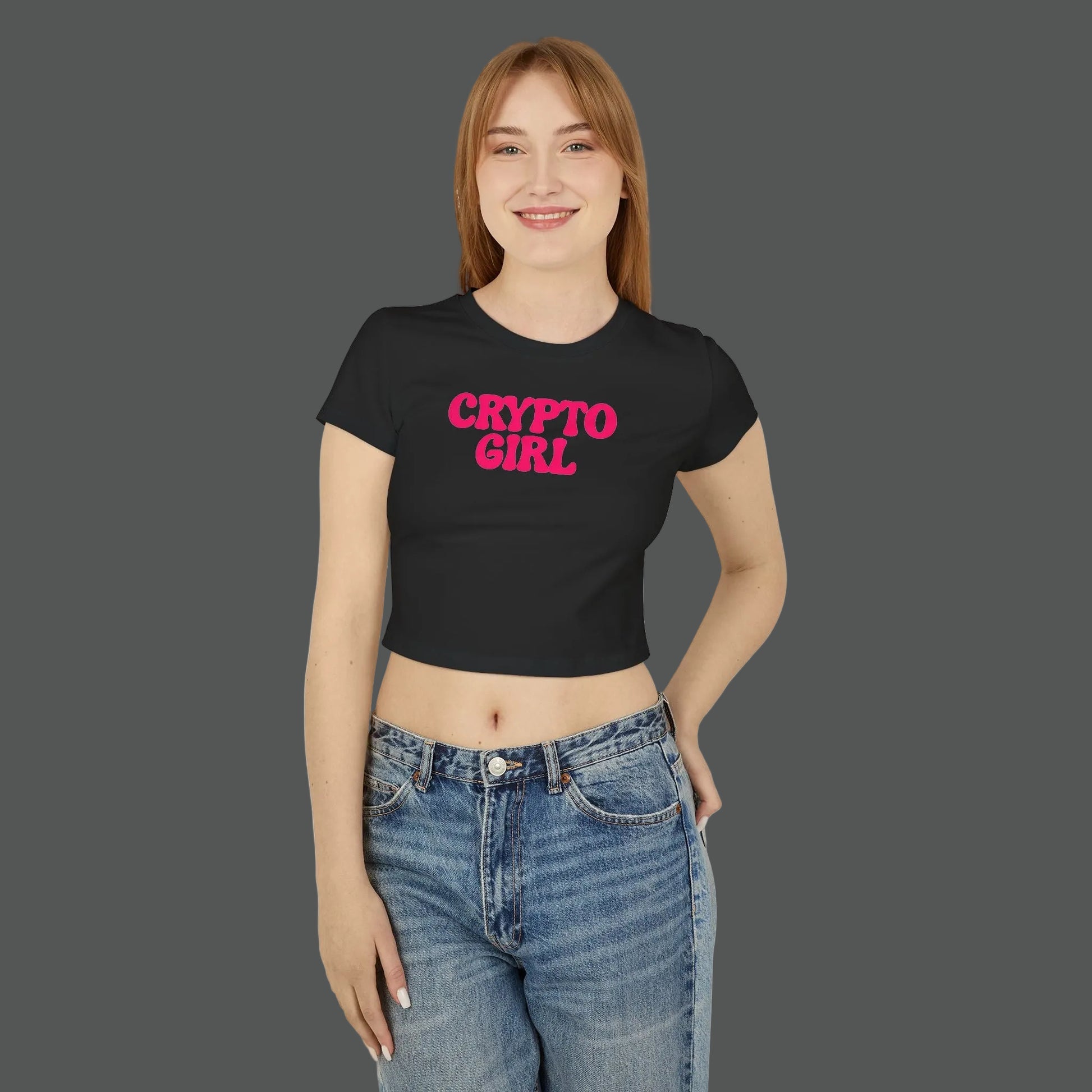 Person wearing a black t-shirt with 'CRYPTO GIRL' in pink text on a white background