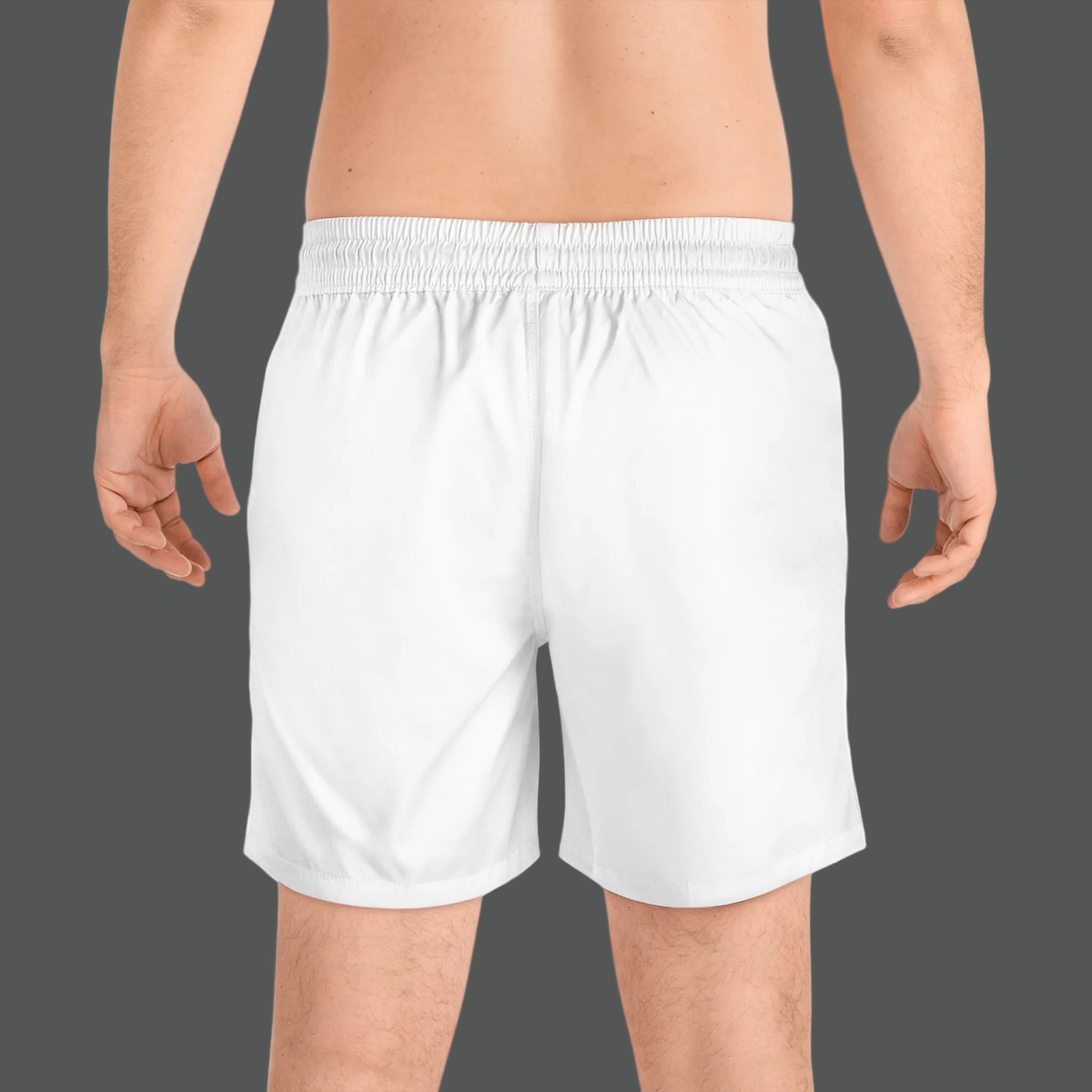 White athletic shorts worn by a person on a white background