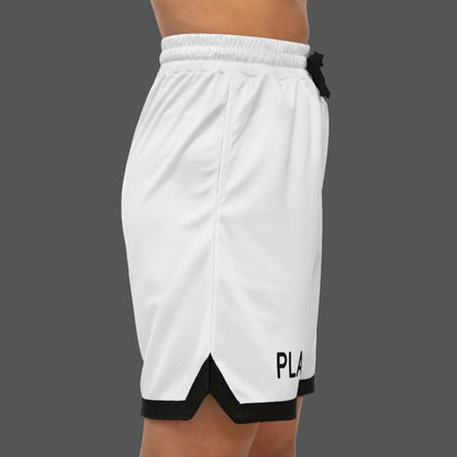 White athletic shorts with black accents and 'PLAY' branding on a white background