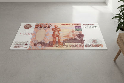 Large Russian 5000 ruble banknote rug on a plain floor.