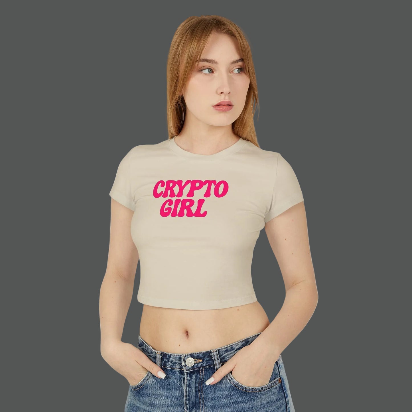 Woman wearing a beige t-shirt with 'CRYPTO GIRL' in pink text on a white background