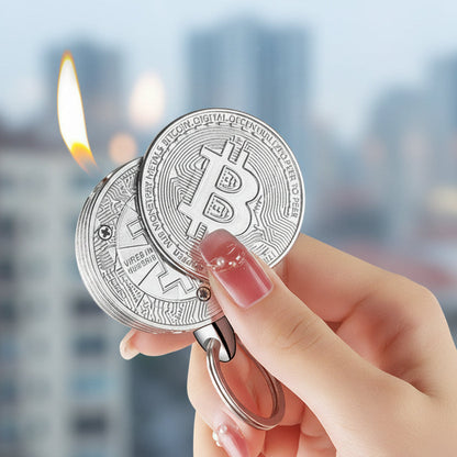 Hand holding two Bitcoin-shaped lighter
