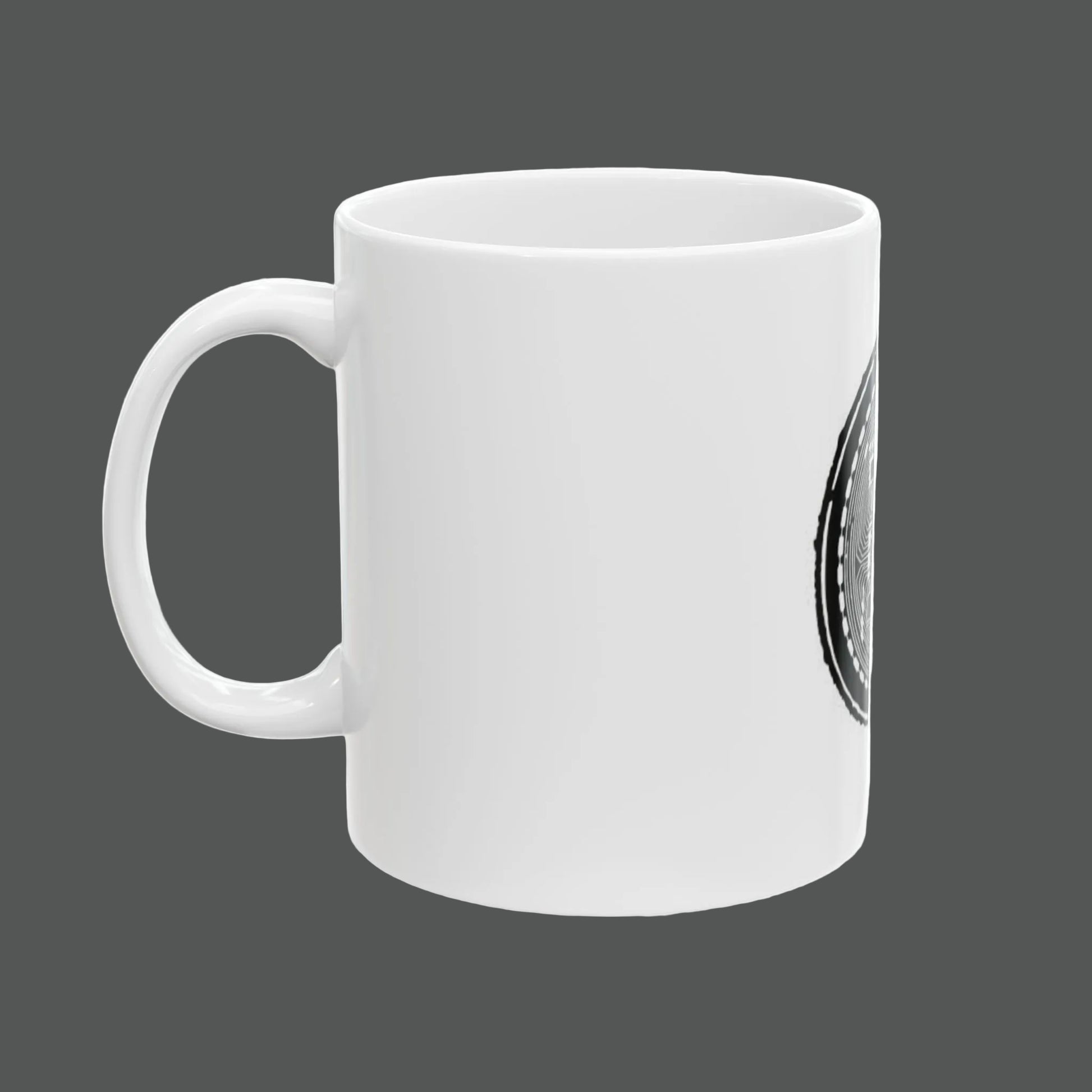 White mug with a black and white design on a white background