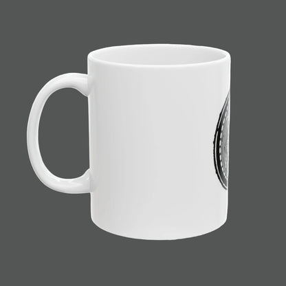 White mug with a black and white design on a white background