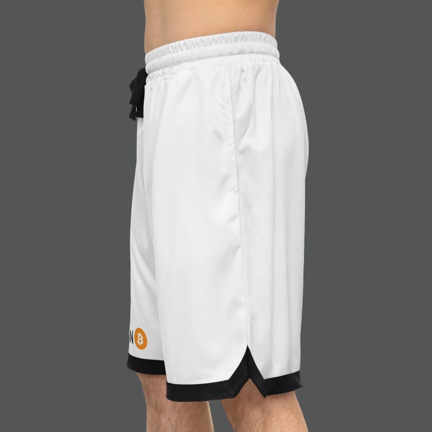 White athletic shorts with black trim and a logo on a white background