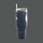 Navy blue tumbler with a design on a white background