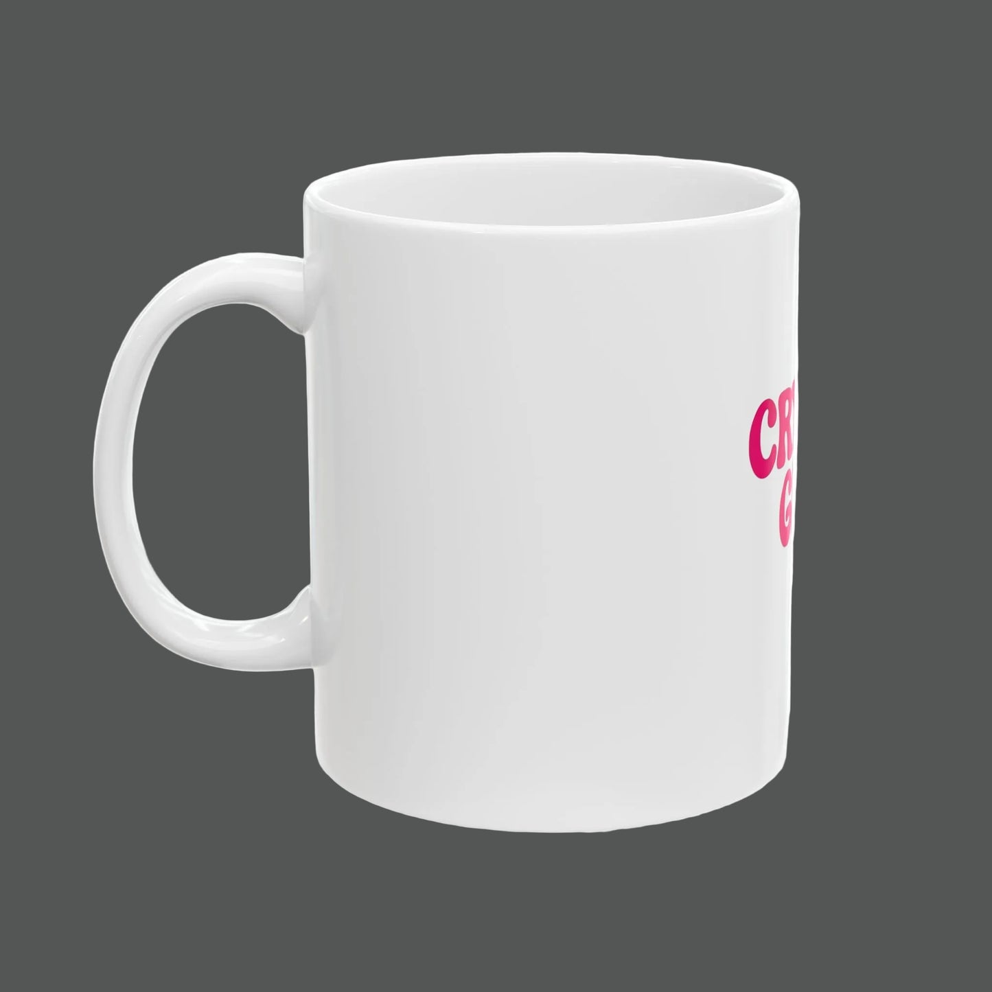 White mug with pink text on a white background