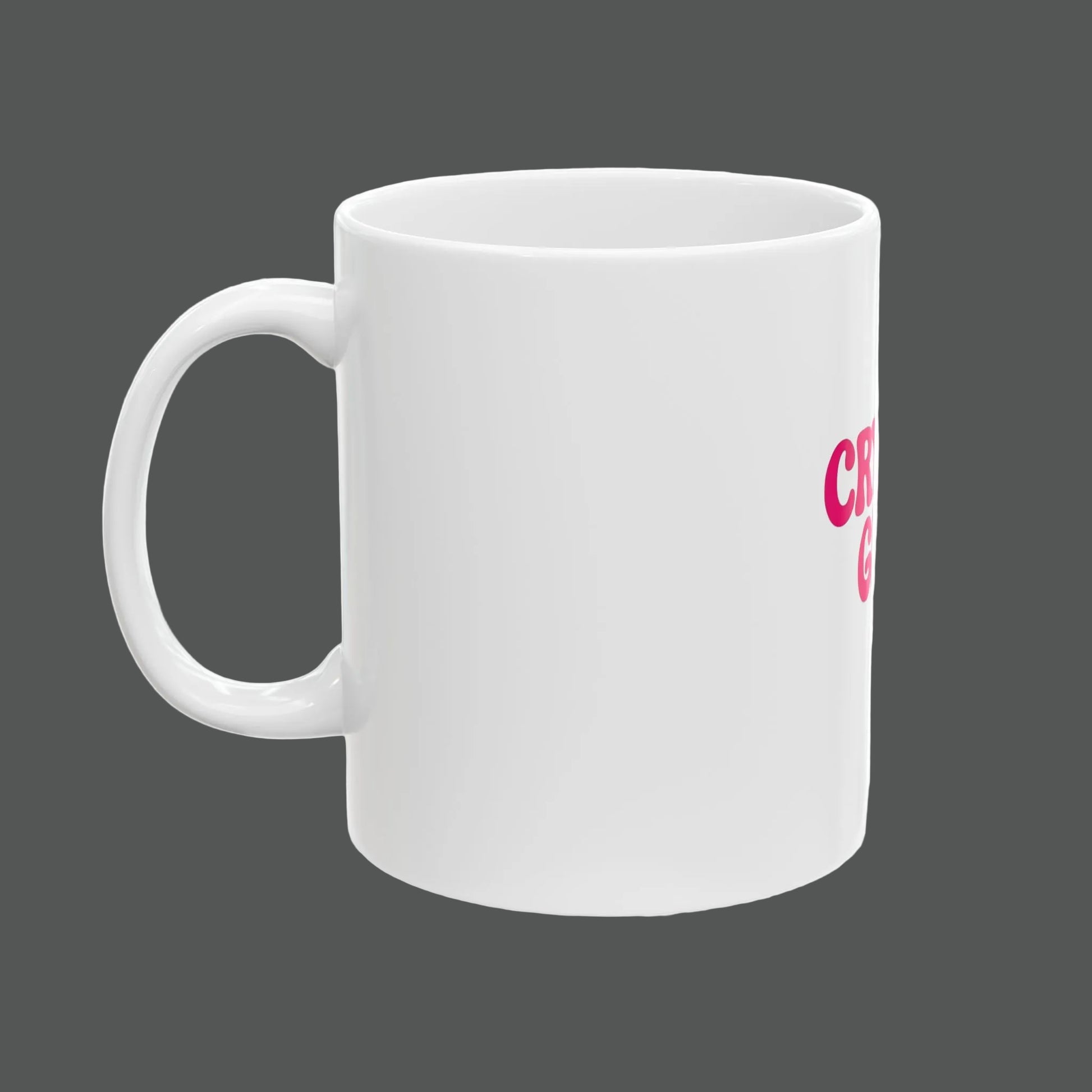 White mug with pink text on a white background