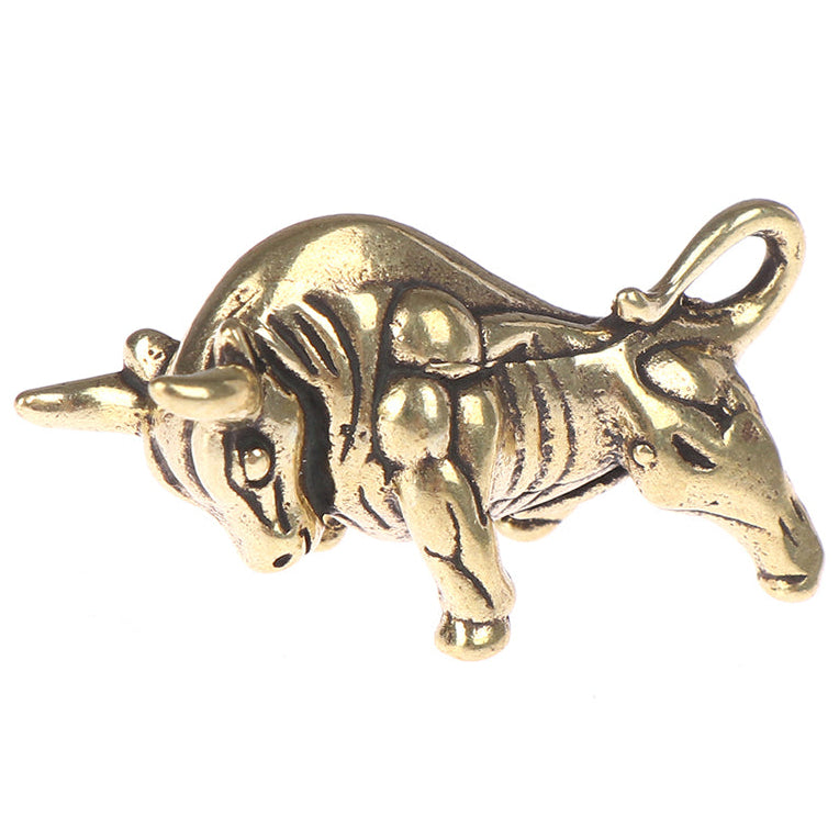 Gold unicorn charm on a white background
