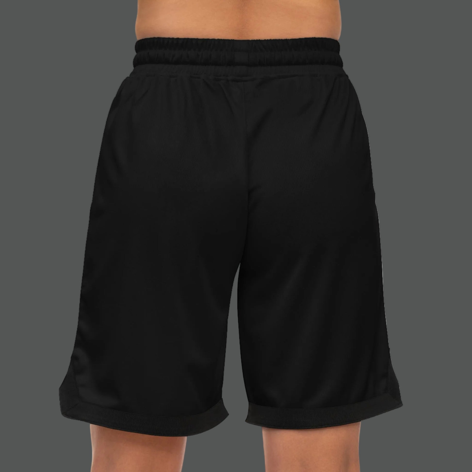Black shorts worn by a person on a white background