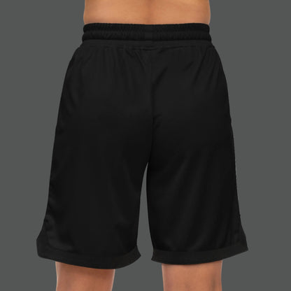 Black shorts worn by a person on a white background
