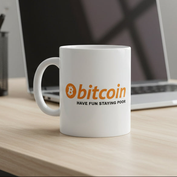 White mug with Bitcoin logo and text on a white background