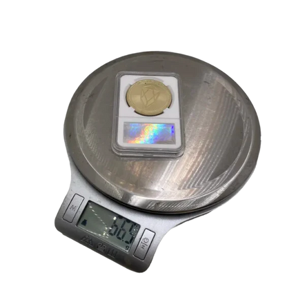 Monero (XMR) coin/medal in case