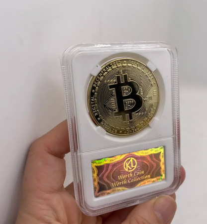 Gold Bitcoin coin in a protective case with KL Worth Coin Collection label.