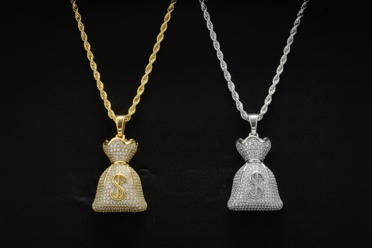 Gold and silver money bag pendants on chains with dollar sign symbol.