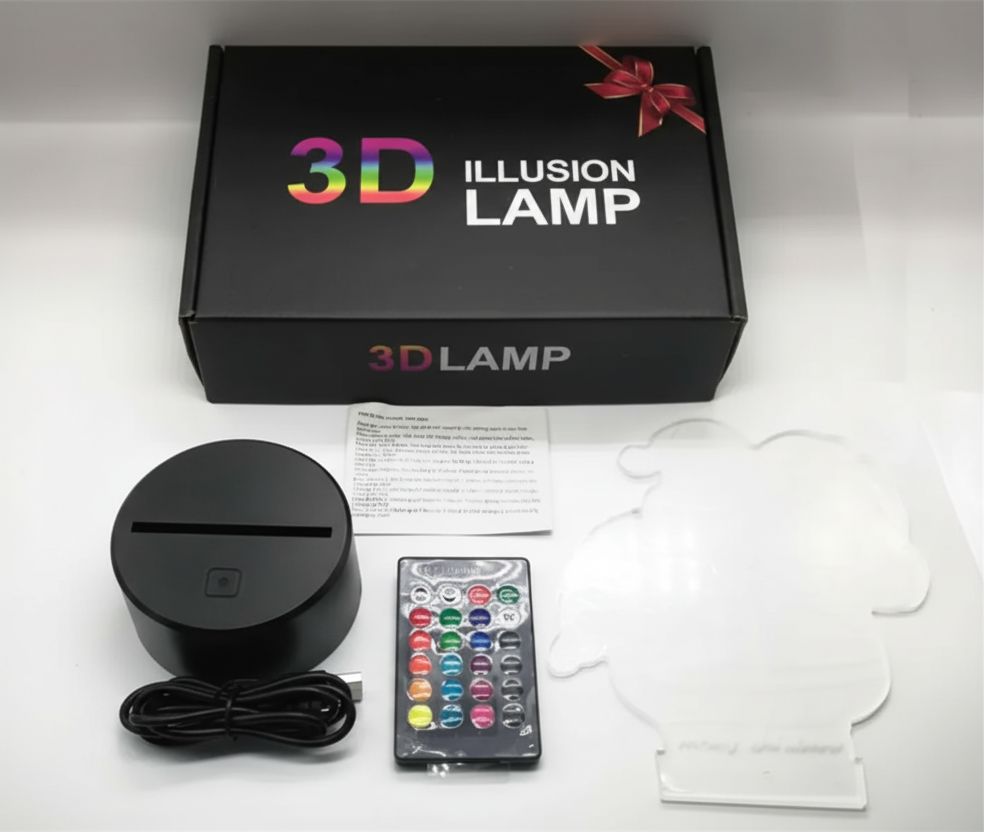 3D Illusion Lamp packaging with lamp, remote control, and instructions on a white background