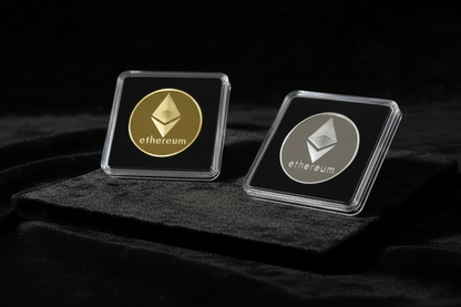 Two Ethereum logos, one gold and one silver, on black backgrounds with white frames.