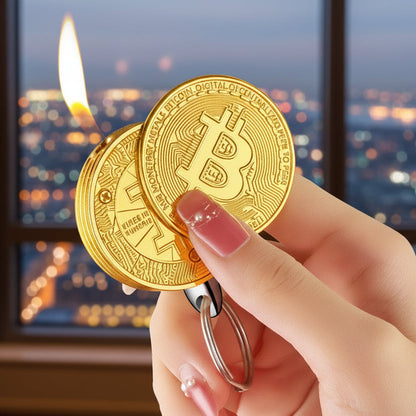 Gold Bitcoin-shaped lighter being lit with a flame 