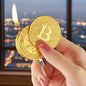 Gold Bitcoin-shaped lighter being lit with a flame 
