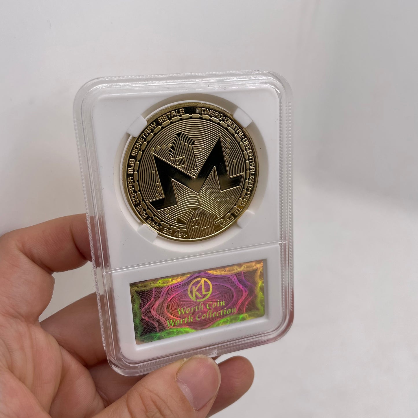 Monero (XMR) coin/medal in case